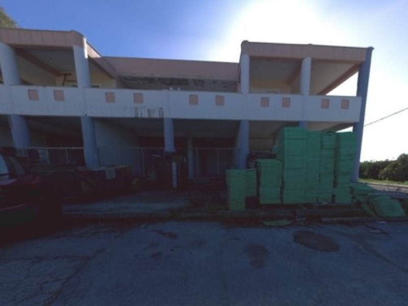 Unfinished Mixed-Use Buildings, Laconia